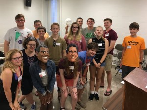 Presidential Politics students pose with Obama and Romney.