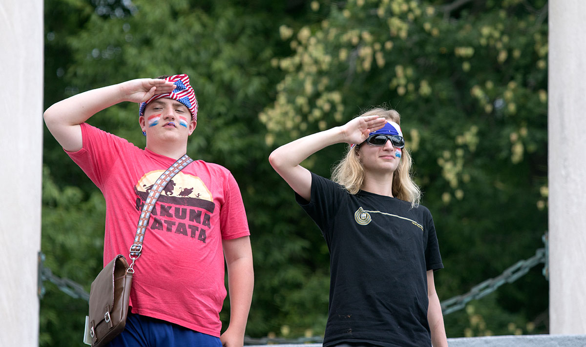 Nick Clevenger of Lexington and Jack Thacker of Louisville salute during the opening ceremonies of VAMPY Olympics Saturday, July 1. Nick and Jack both competed on behalf of team USA for the day's events. (Photo by Brook Joyner)