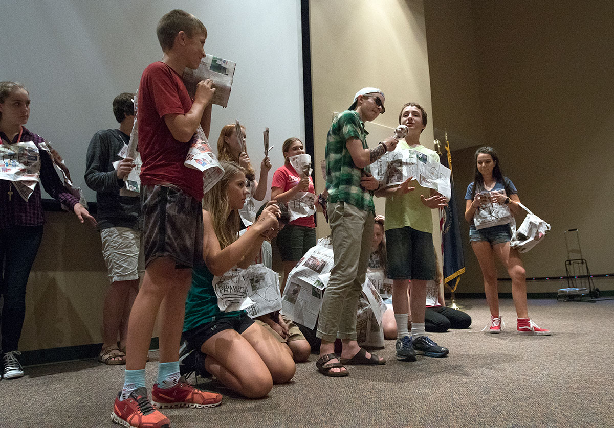 A group of campers perform Little Red Riding Hood: Reality TV Edition for paper theater Saturday, July 1. (Photo by Brook Joyner)